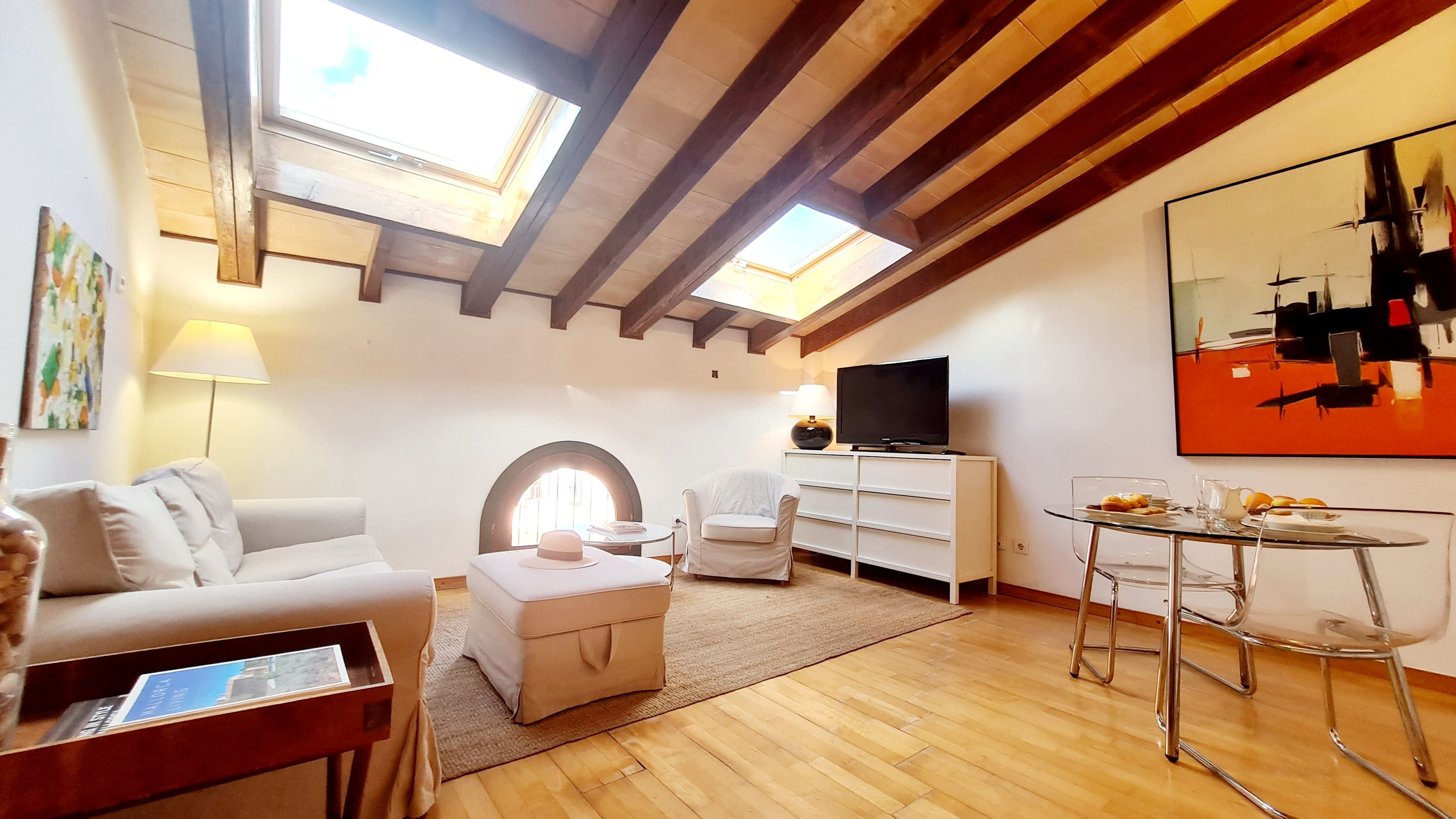 Sala d'estar de Apartament de lloguer en  Palma de Mallorca amb Aire condicionat i Moblat