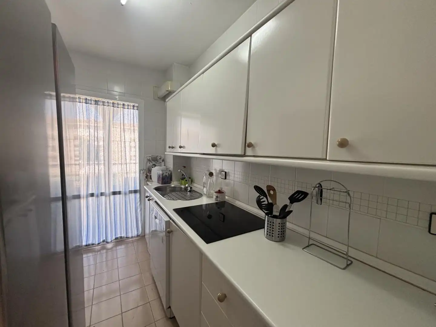 Cocina de Piso de alquiler en El Portil con Jardín privado, Terraza y Piscina