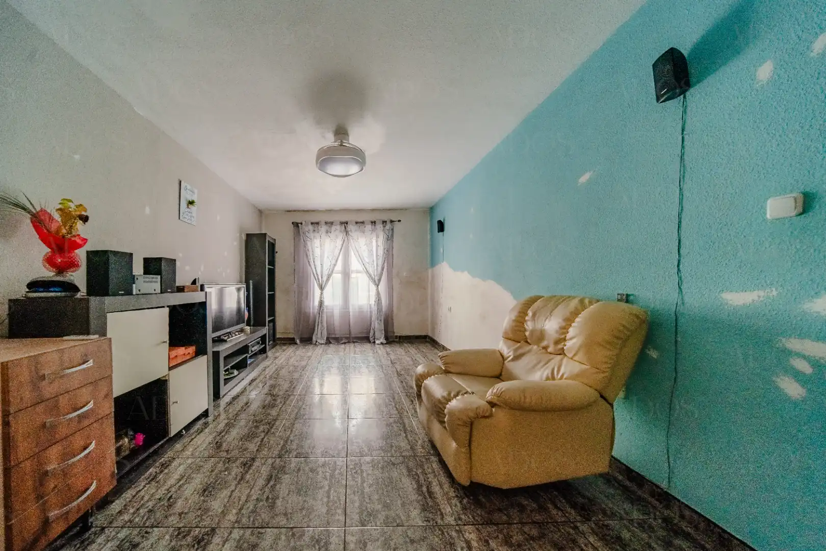 Sala d'estar de Casa adosada en venda en Balanegra amb Aire condicionat, Terrassa i Moblat