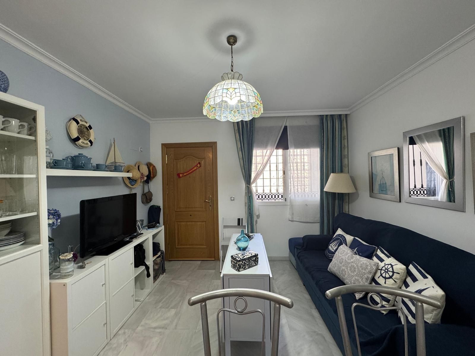 Sala d'estar de Apartament en venda en Fuengirola amb Aire condicionat, Balcó i Piscina comunitària