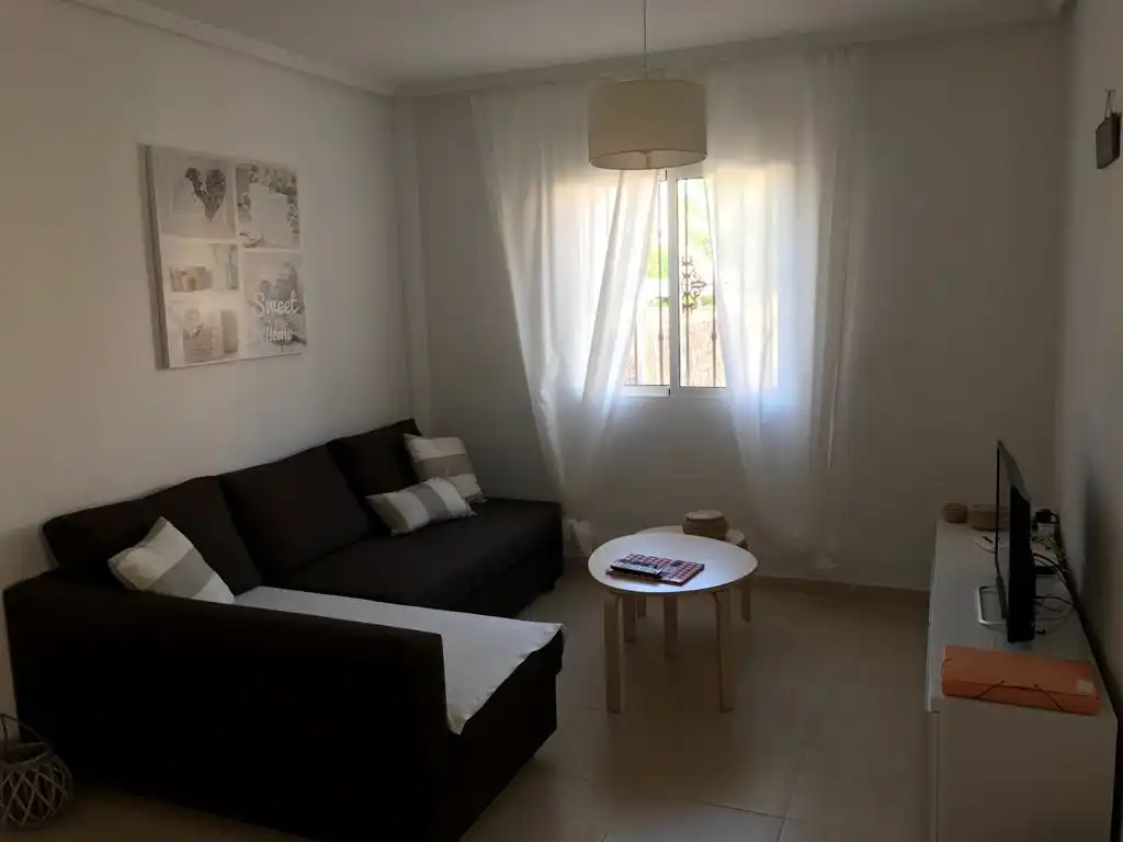 Sala d'estar de Casa adosada en venda en Rojales amb Aire condicionat, Calefacció i Jardí privat
