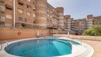 Swimming pool of Flat for sale in  Granada Capital  with Air Conditioner, Heating and Private garden