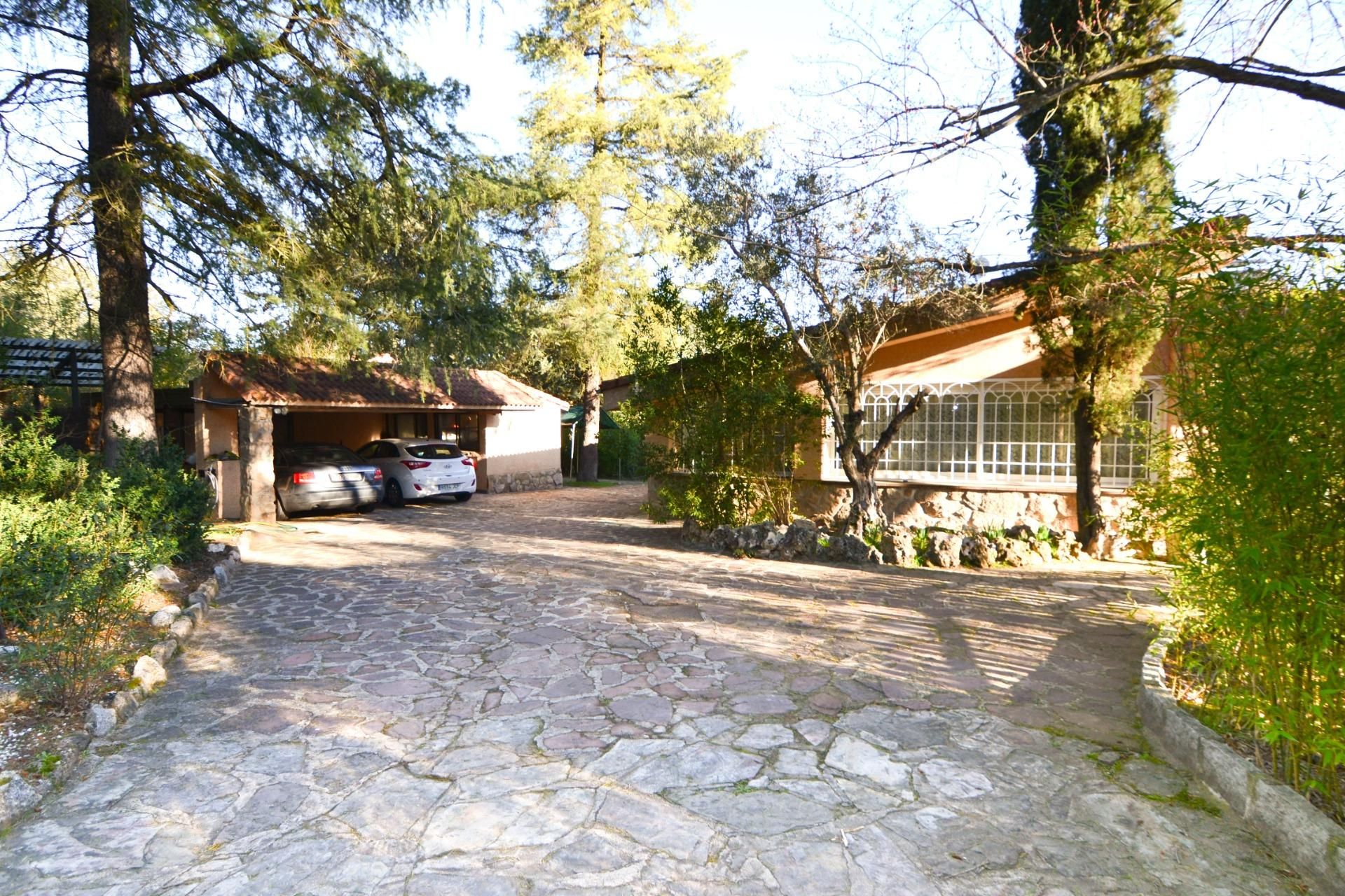 Vista exterior de Casa o chalet en venta en Villanueva de la Cañada con Aire acondicionado, Jardín privado y Terraza