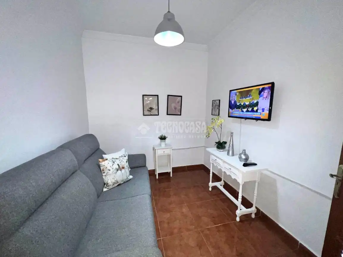 Sala d'estar de Casa adosada en venda en Santa Lucía de Tirajana amb Aire condicionat, Terrassa i Traster