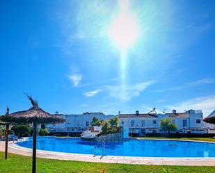 Jardí de Casa adosada en venda en Chiclana de la Frontera amb Calefacció, Traster i Piscina comunitària