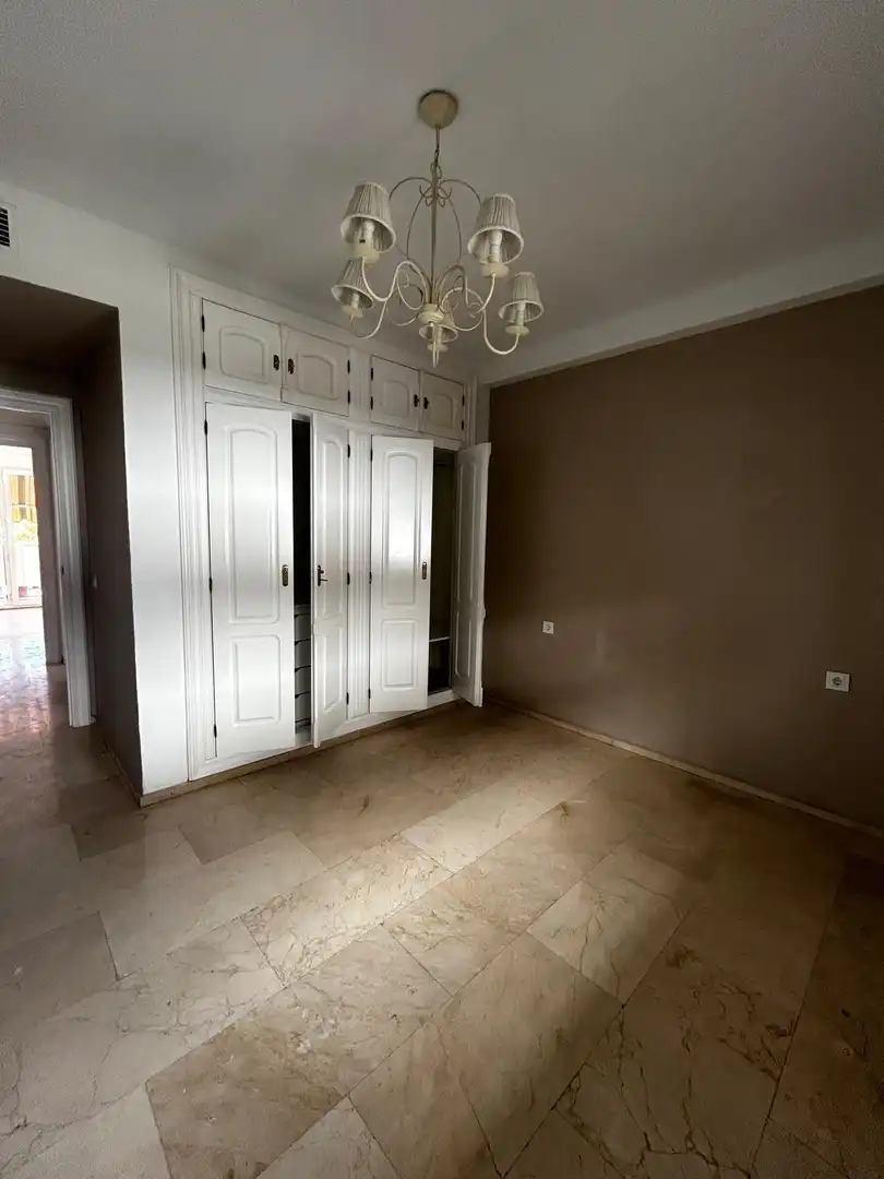 Habitación de Piso de alquiler en Córdoba con Aire acondicionado, Jardín privado y Piscina comunitaria