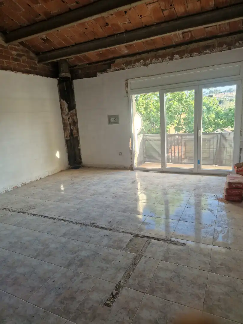Sala d'estar de Casa adosada en venda en Sant Quirze del Vallès amb Calefacció, Jardí privat i Terrassa