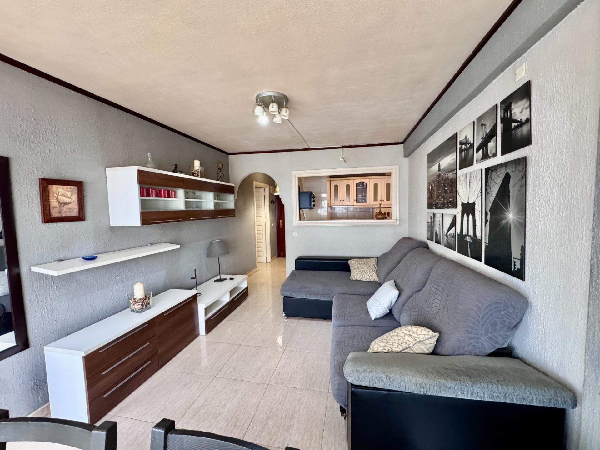 Living room of Flat for sale in Benalmádena  with Private garden, Terrace and Community pool