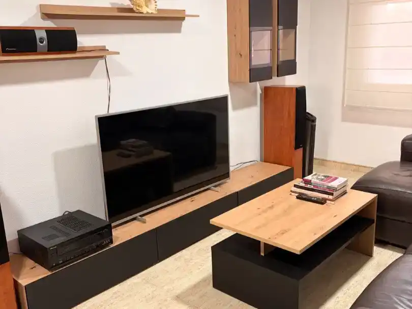 Sala d'estar de Dúplex per a compartir en Almería amb Aire condicionat, Moblat i Balcó