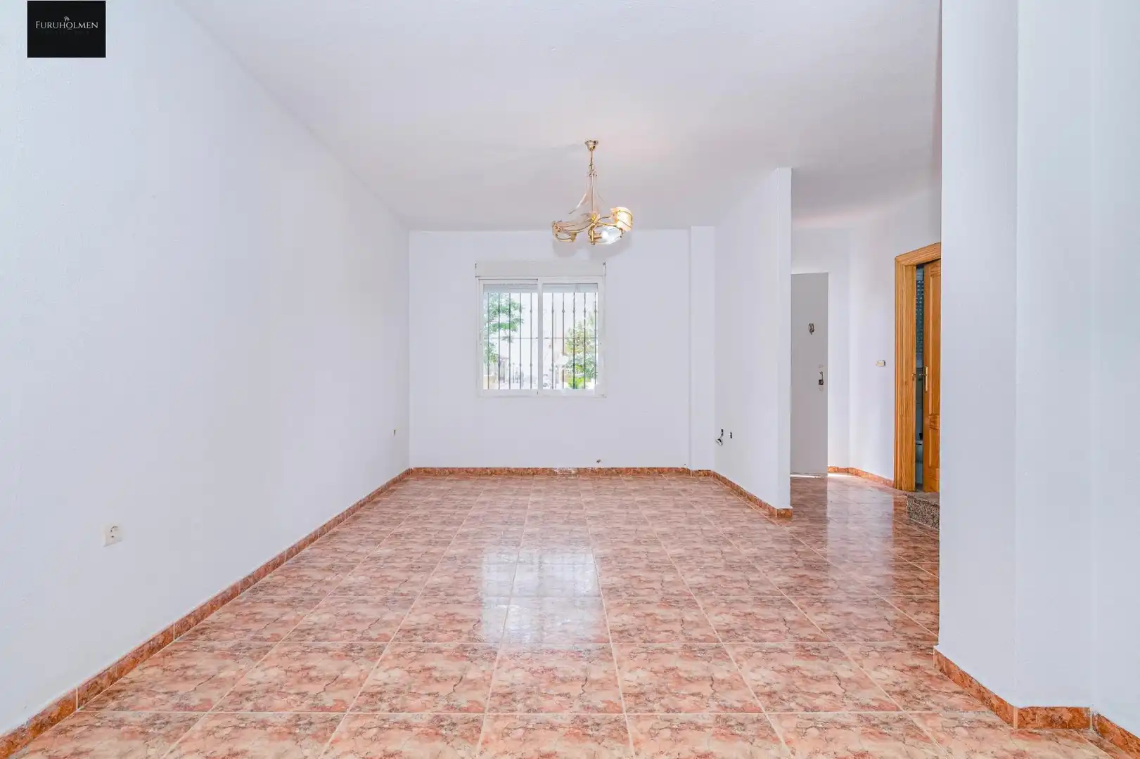 Sala d'estar de Casa adosada en venda en Las Gabias amb Balcó