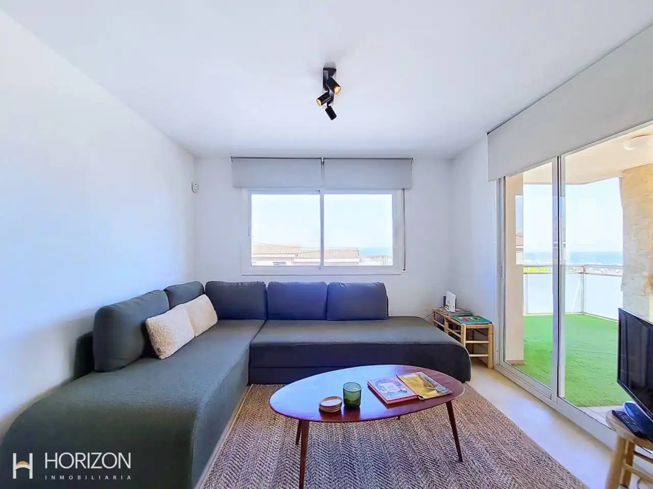 Sala de estar de Casa adosada en venta en Calafell con Aire acondicionado, Calefacción y Jardín privado