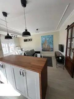 Sala d'estar de Apartament en venda en León Capital  amb Calefacció, Parquet i Terrassa