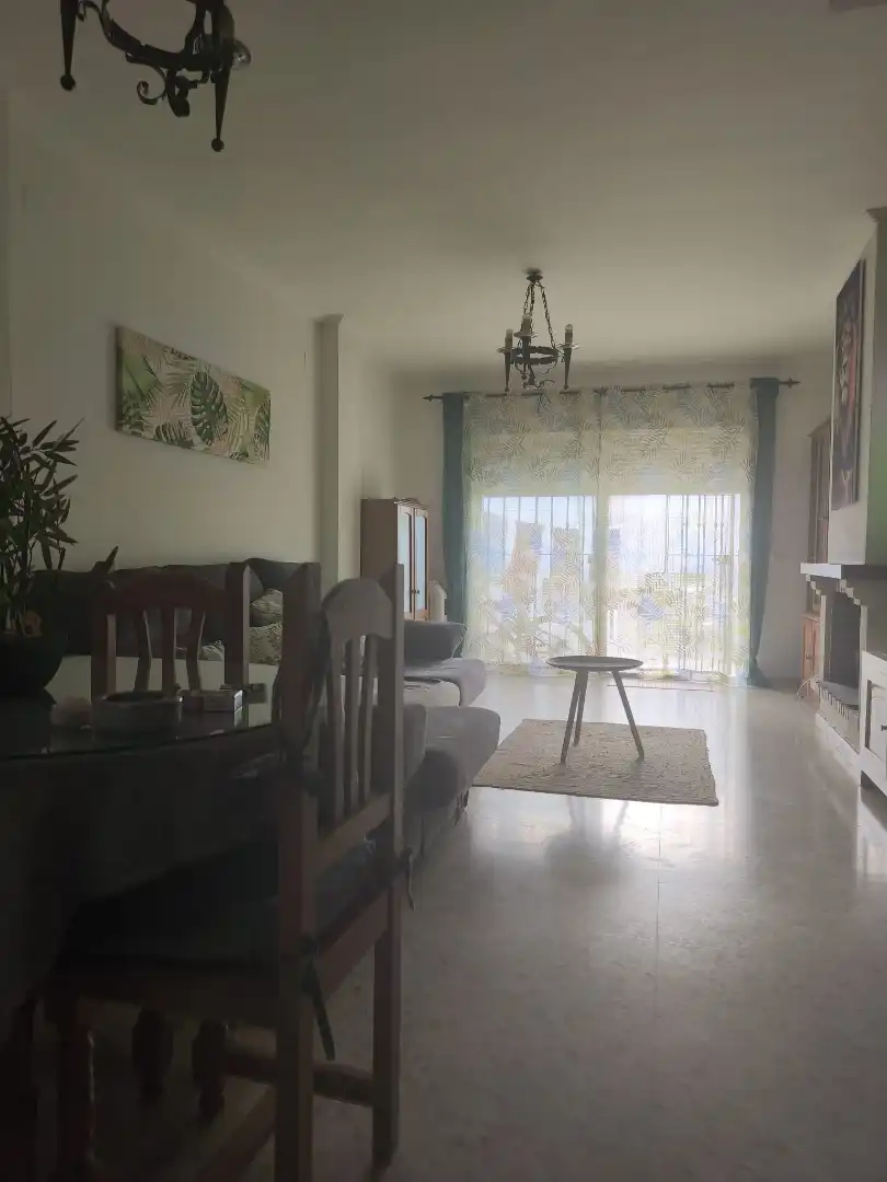 Sala d'estar de Casa adosada en venda en El Portil amb Terrassa, Moblat i Piscina comunitària