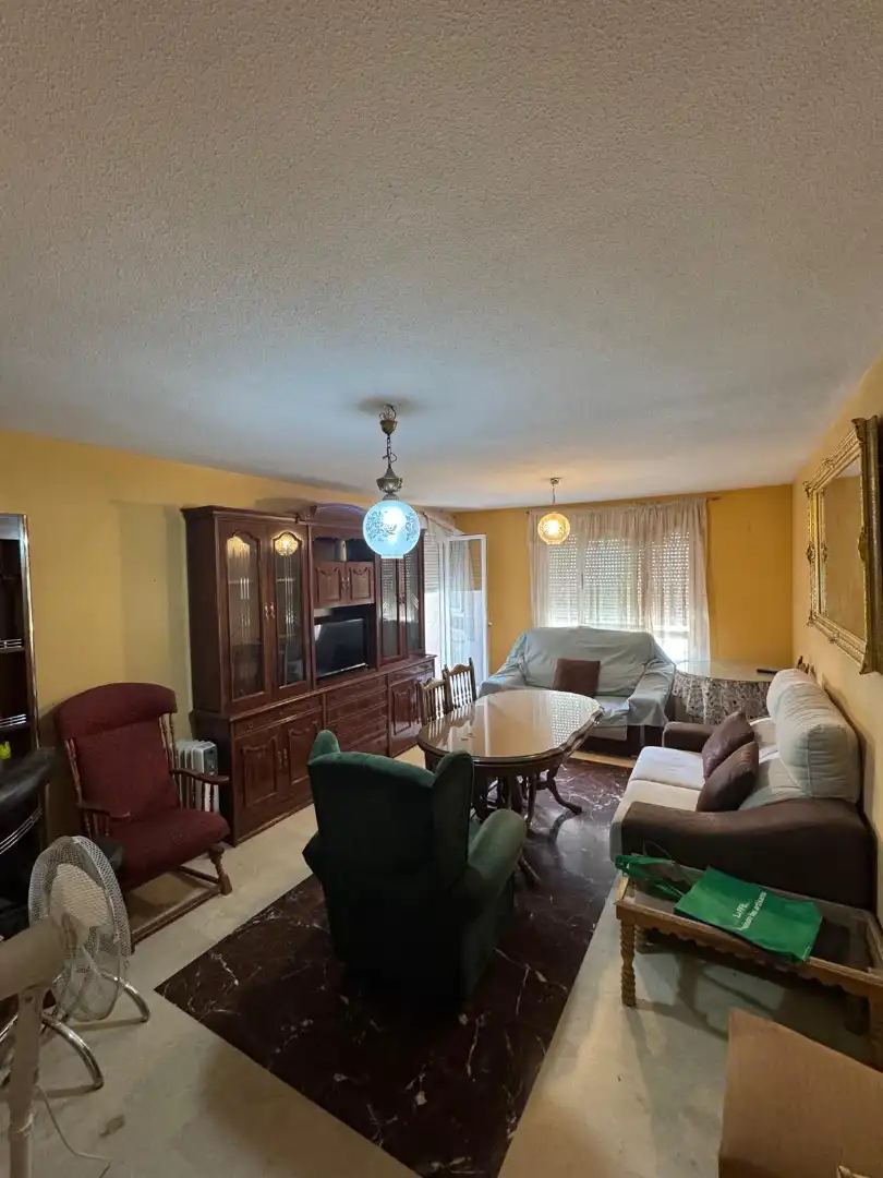Living room of Flat for share in Jaén  with Swimming Pool, Furnished and Community pool