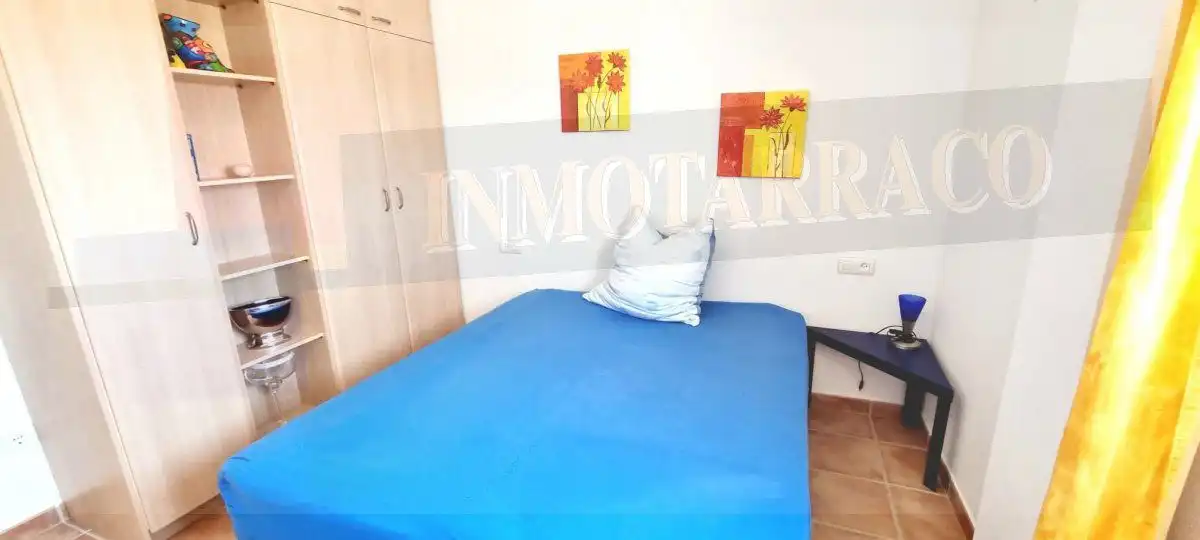Dormitori de Apartament de lloguer en Águilas amb Aire condicionat i Terrassa