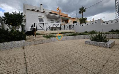 Vista exterior de Casa adosada en venda en La Nucia amb Aire condicionat, Calefacció i Jardí privat