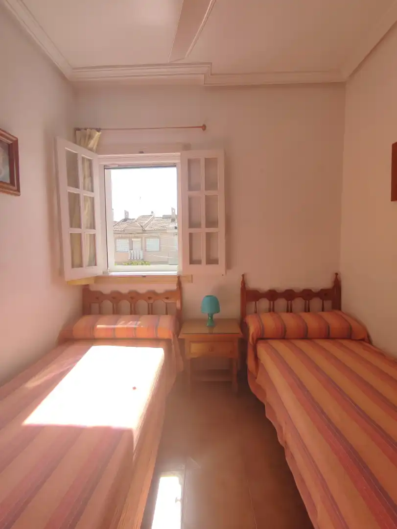 Habitación de Casa adosada en venta en San Pedro del Pinatar con Aire acondicionado, Calefacción y Jardín privado