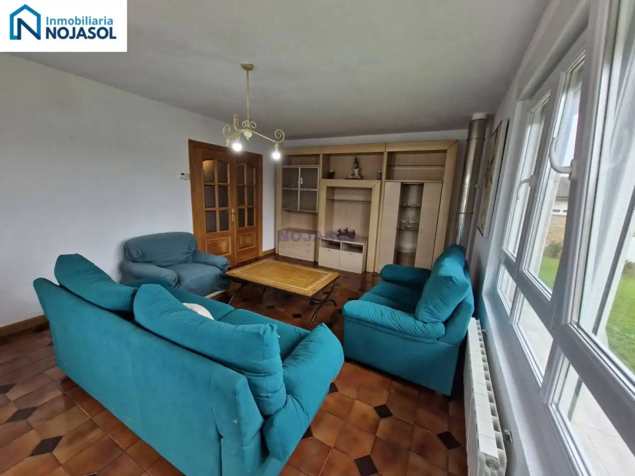 Sala d'estar de Casa o xalet en venda en Bareyo amb Calefacció, Jardí privat i Terrassa