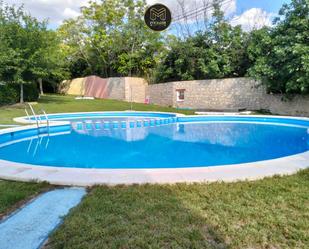 Swimming pool of Single-family semi-detached for sale in  Jaén Capital  with Air Conditioner, Heating and Storage room