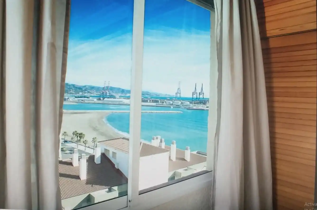 Schlafzimmer von Wohnung zur Miete in Málaga mit Möbliert und Waschmaschine