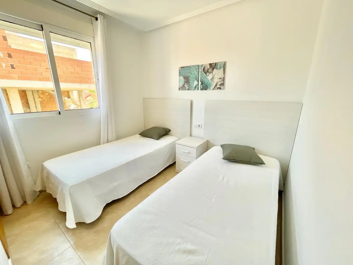 Dormitori de Apartament de lloguer en Los Alcázares amb Aire condicionat, Terrassa i Traster