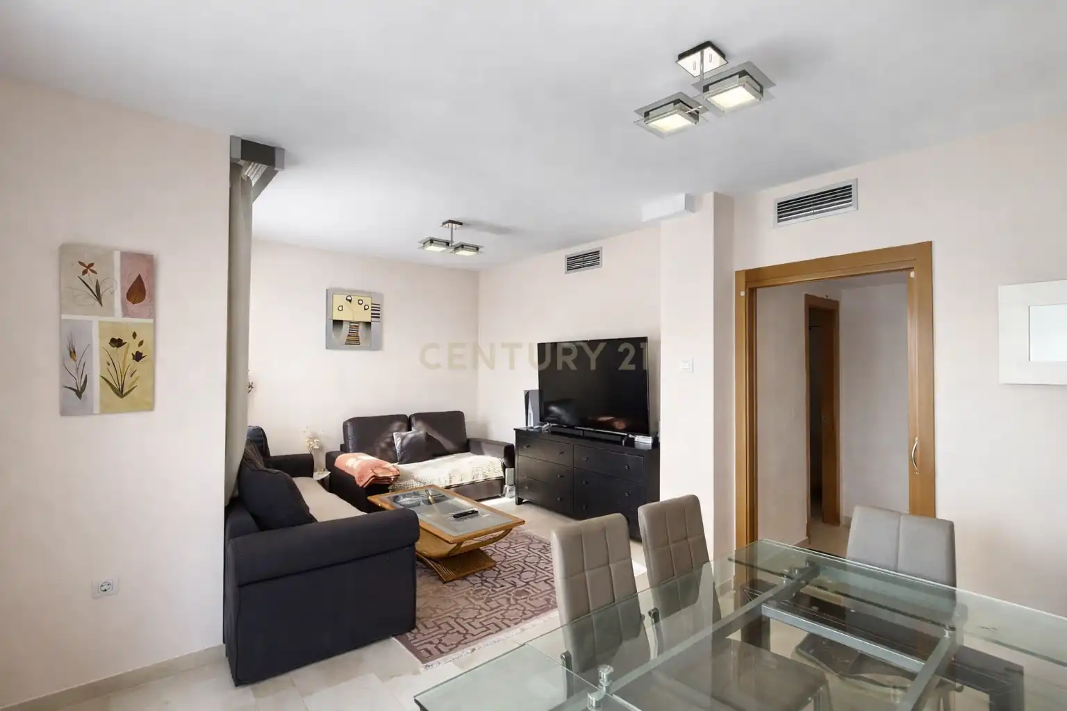 Sala de estar de Casa adosada en venta en La Nucia con Aire acondicionado, Trastero y Horno