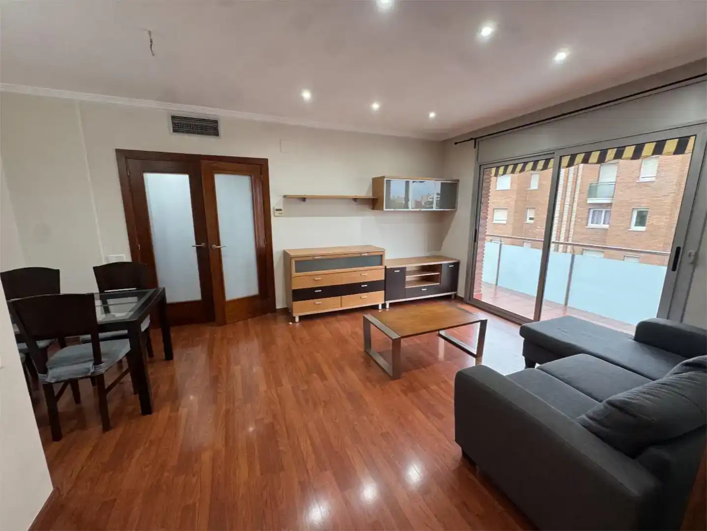Living room of Flat for rent in Premià de Mar  with Air Conditioner, Parquet flooring and Storage room