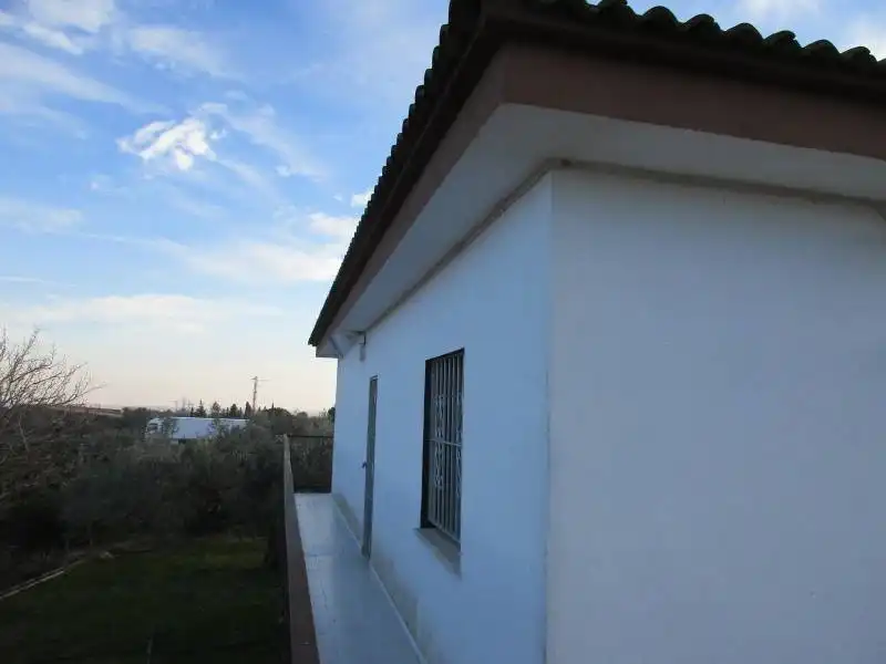 Vista exterior de Casa o xalet en venda en L'Aldea amb Aire condicionat, Jardí privat i Terrassa