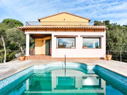 Swimming pool of Country house for sale in Lloret de Mar