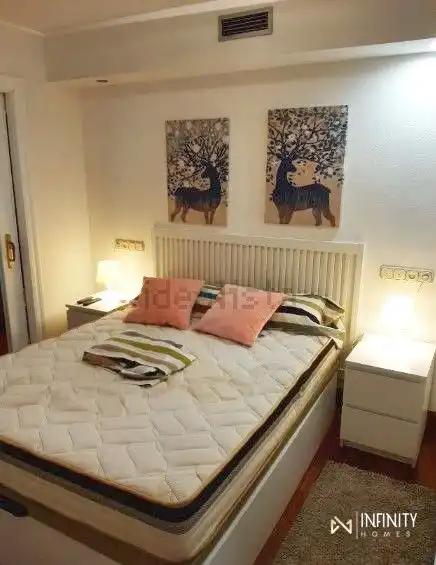 Dormitori de Apartament de lloguer en Bilbao  amb Aire condicionat, Calefacció i Balcó