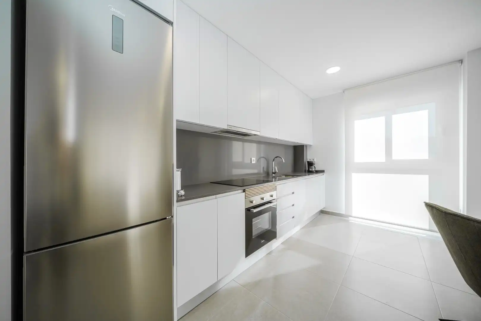 Cuina de Apartament en venda en La Manga del Mar Menor amb Aire condicionat, Terrassa i Piscina