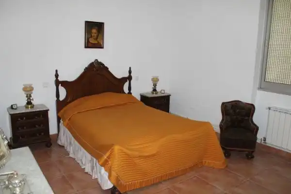 Habitación de Casa adosada en venta en Urda con Calefacción, Terraza y Trastero