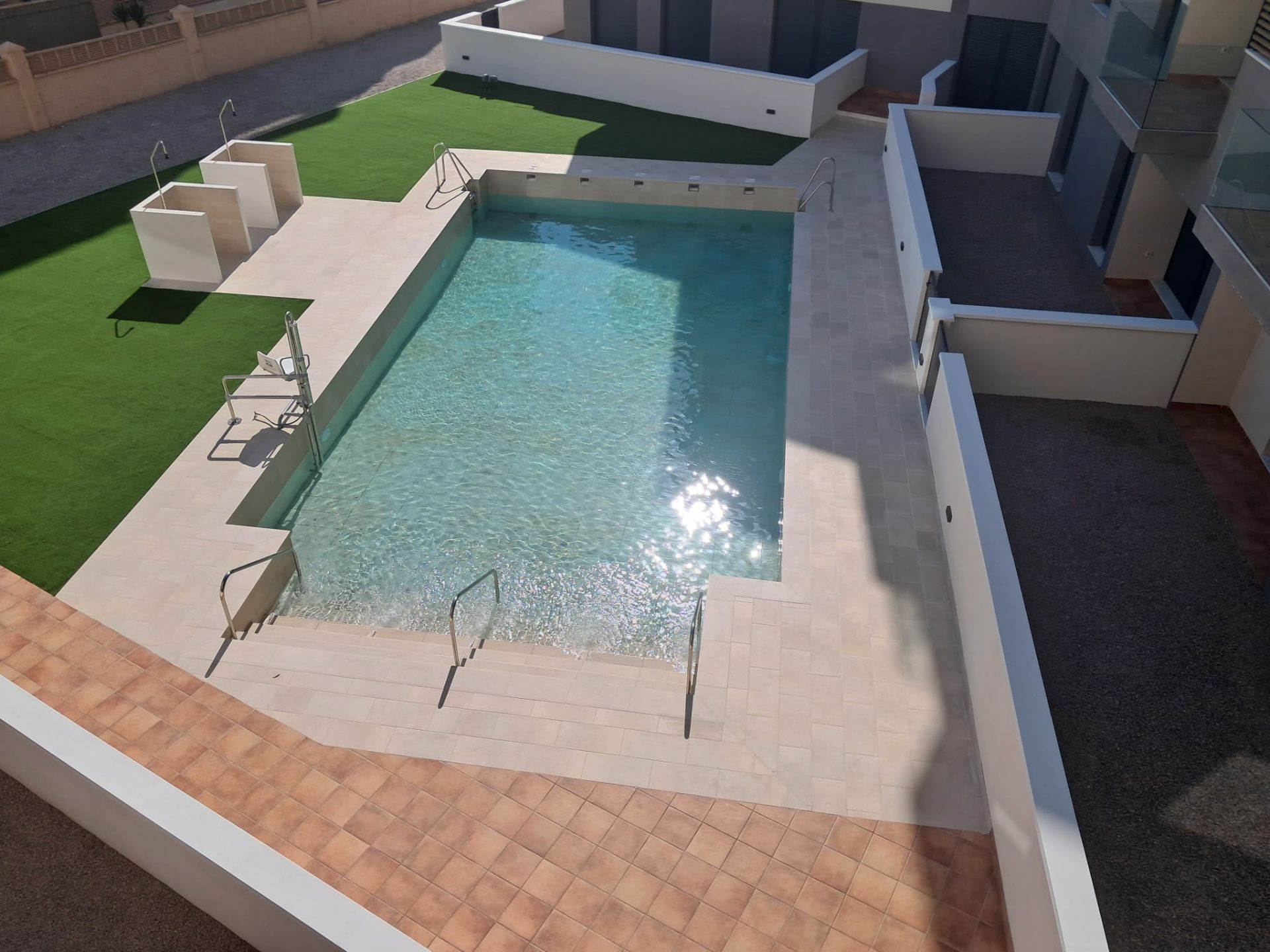 Swimming pool of Flat for sale in Roquetas de Mar  with Air Conditioner, Heating and Parquet flooring