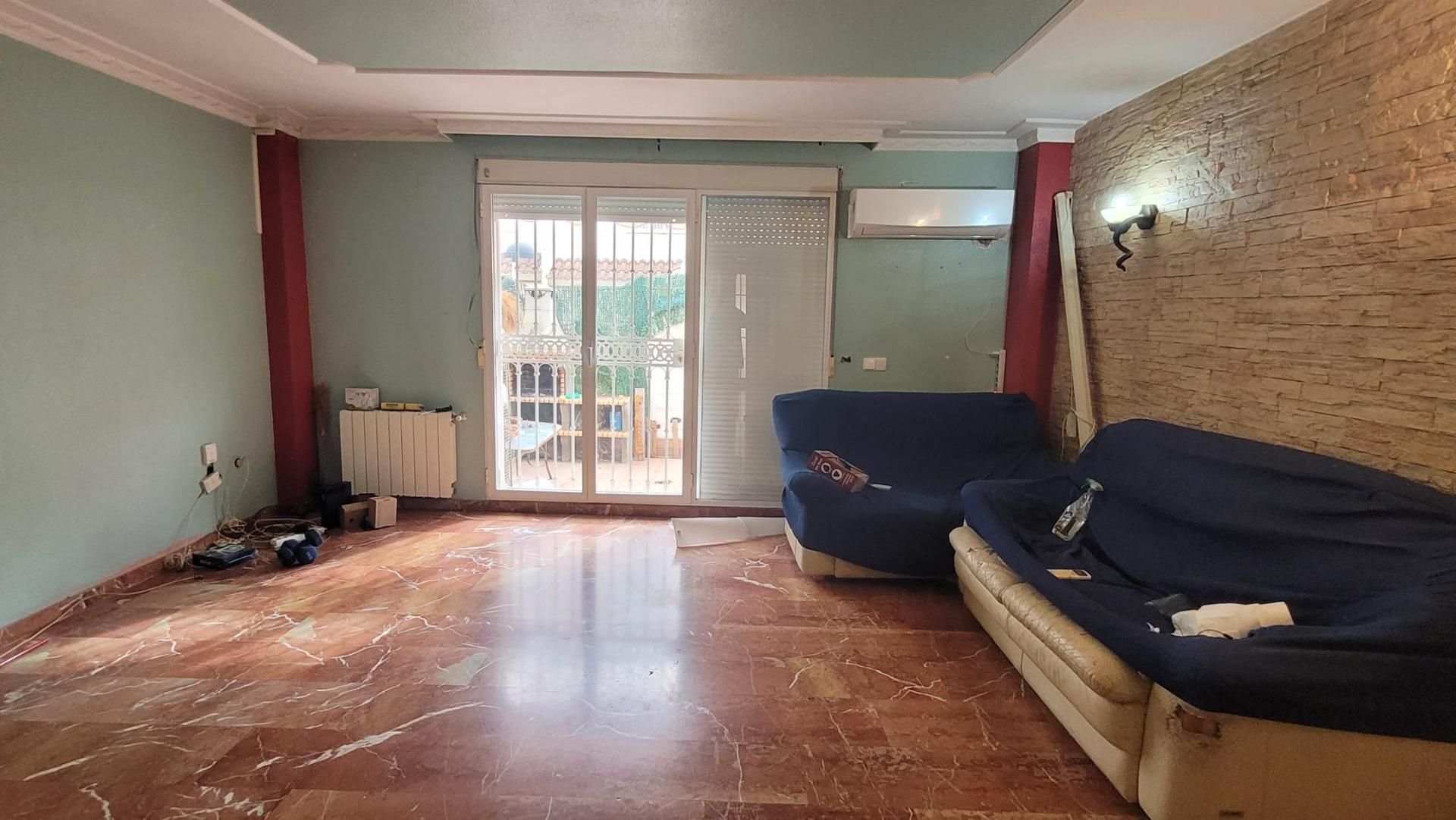 Sala de estar de Casa adosada en venta en Burjassot con Aire acondicionado, Calefacción y Jardín privado