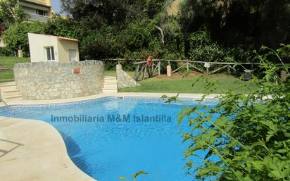 Piscina de Casa adosada en venda en Islantilla amb Terrassa, Moblat i Rentadora