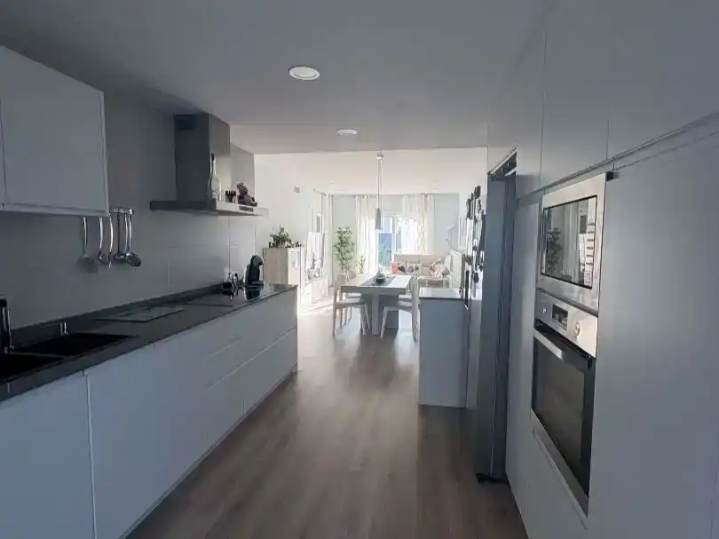 Kitchen of Flat for sale in Cunit  with Air Conditioner, Private garden and Parquet flooring
