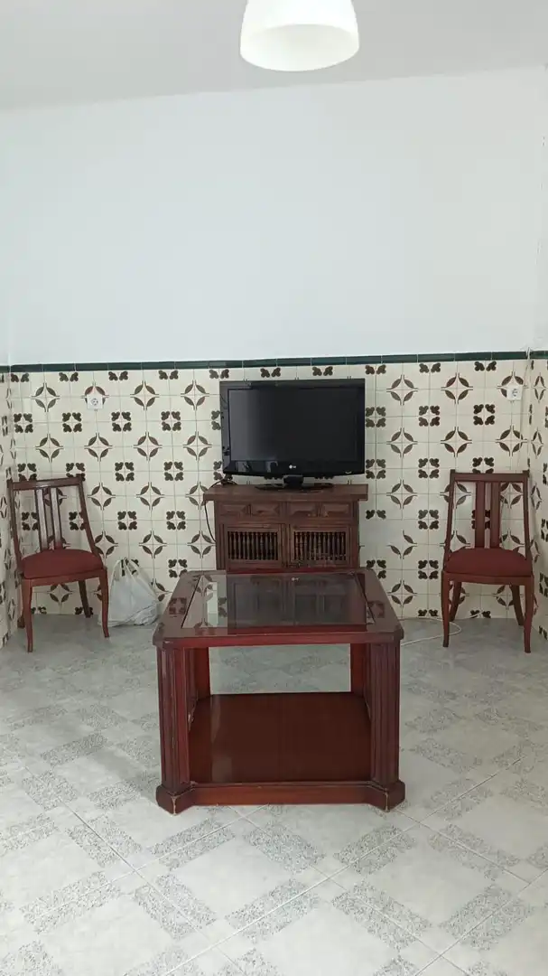 Living room of Houses for sale in Brenes  with Swimming Pool
