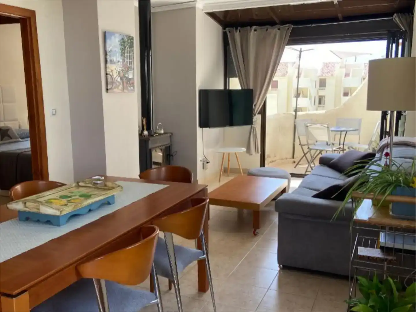 Sala d'estar de Pis de lloguer en Dénia amb Aire condicionat, Jardí privat i Piscina