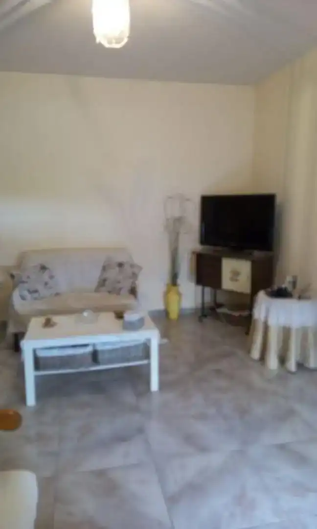Sala d'estar de Casa adosada en venda en Torreorgaz
