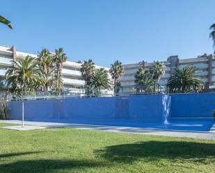 Swimming pool of Planta baja for sale in Salou  with Air Conditioner, Heating and Private garden