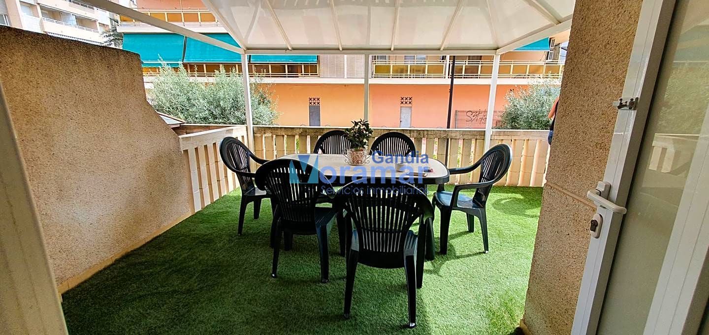 Terrassa de Apartament de lloguer en Daimús amb Aire condicionat, Moblat i Piscina comunitària