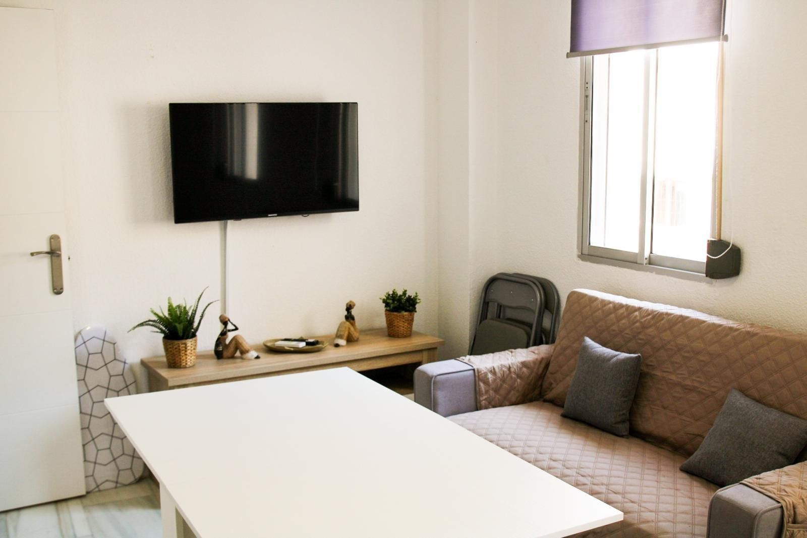 Sala d'estar de Estudi de lloguer en  Granada Capital amb Terrassa