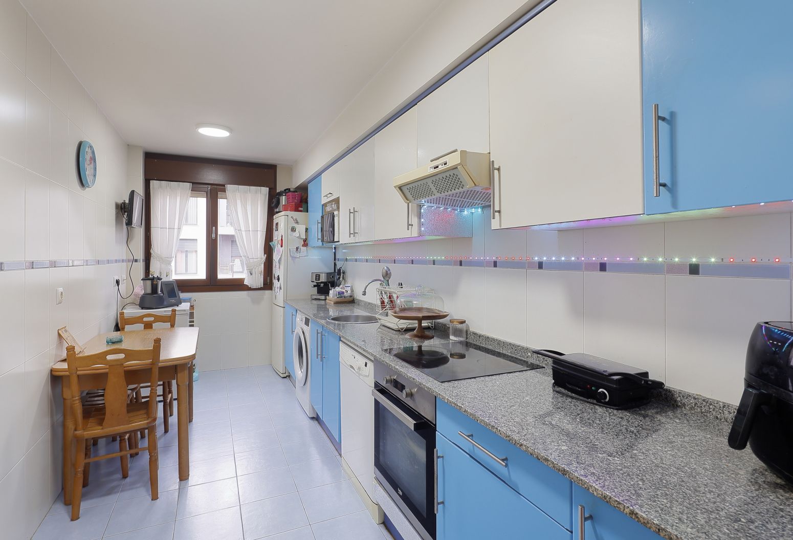 Kitchen of Flat for sale in Gijón   with Heating, Parquet flooring and Storage room