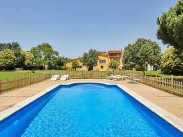 Maison rustique avec piscine à vendre à Cassà de la Selva