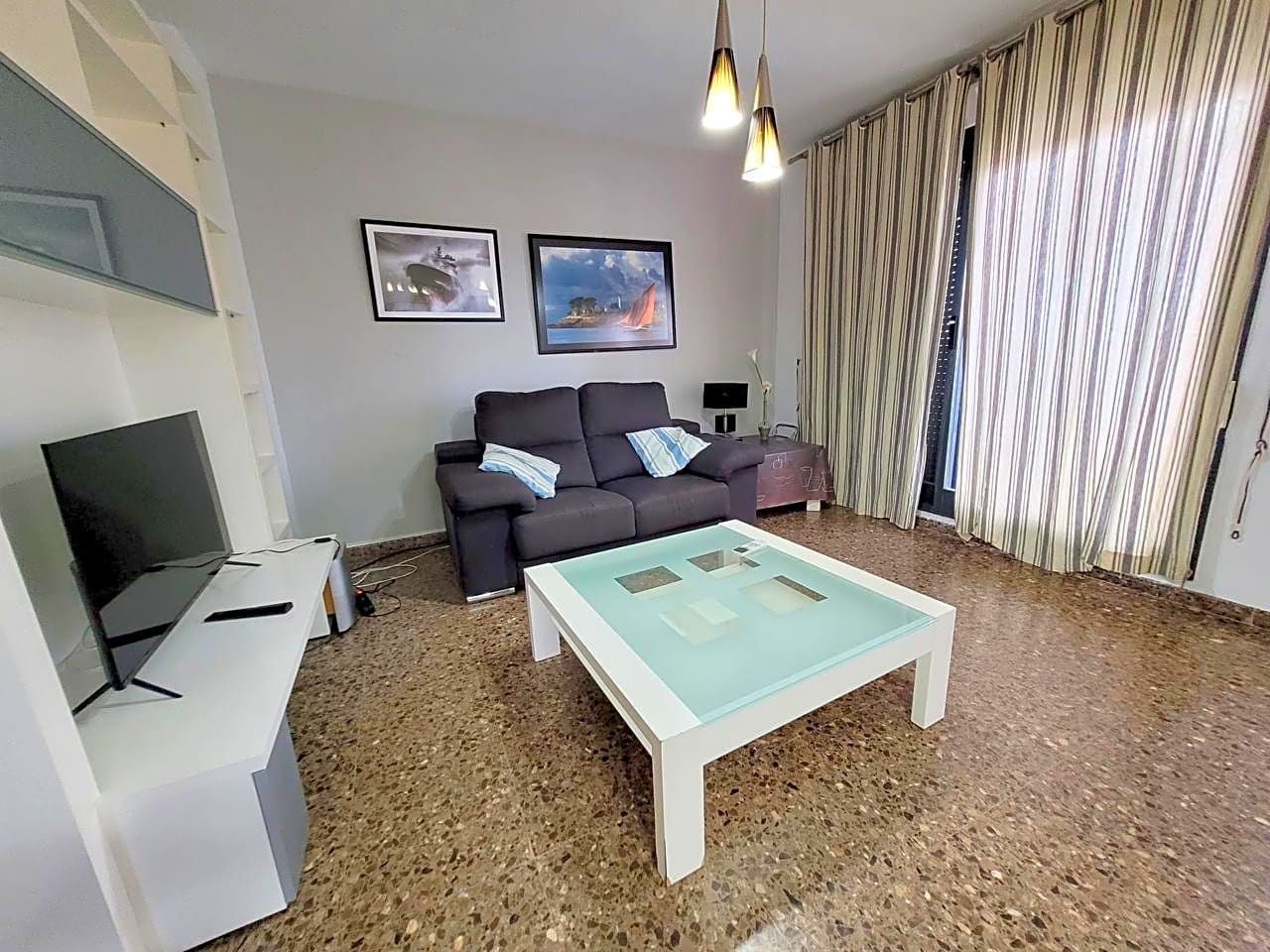 Sala d'estar de Àtic de lloguer en Gandia amb Aire condicionat, Terrassa i Moblat