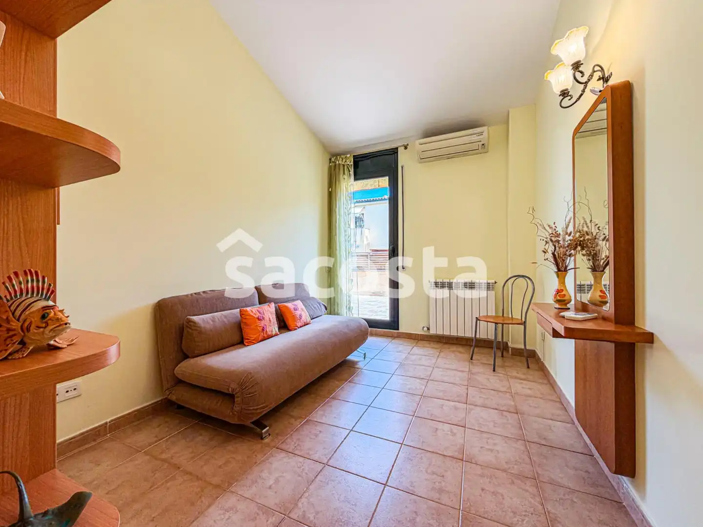 Sala de estar de Casa adosada en venta en Lloret de Mar con Aire acondicionado, Calefacción y Jardín privado