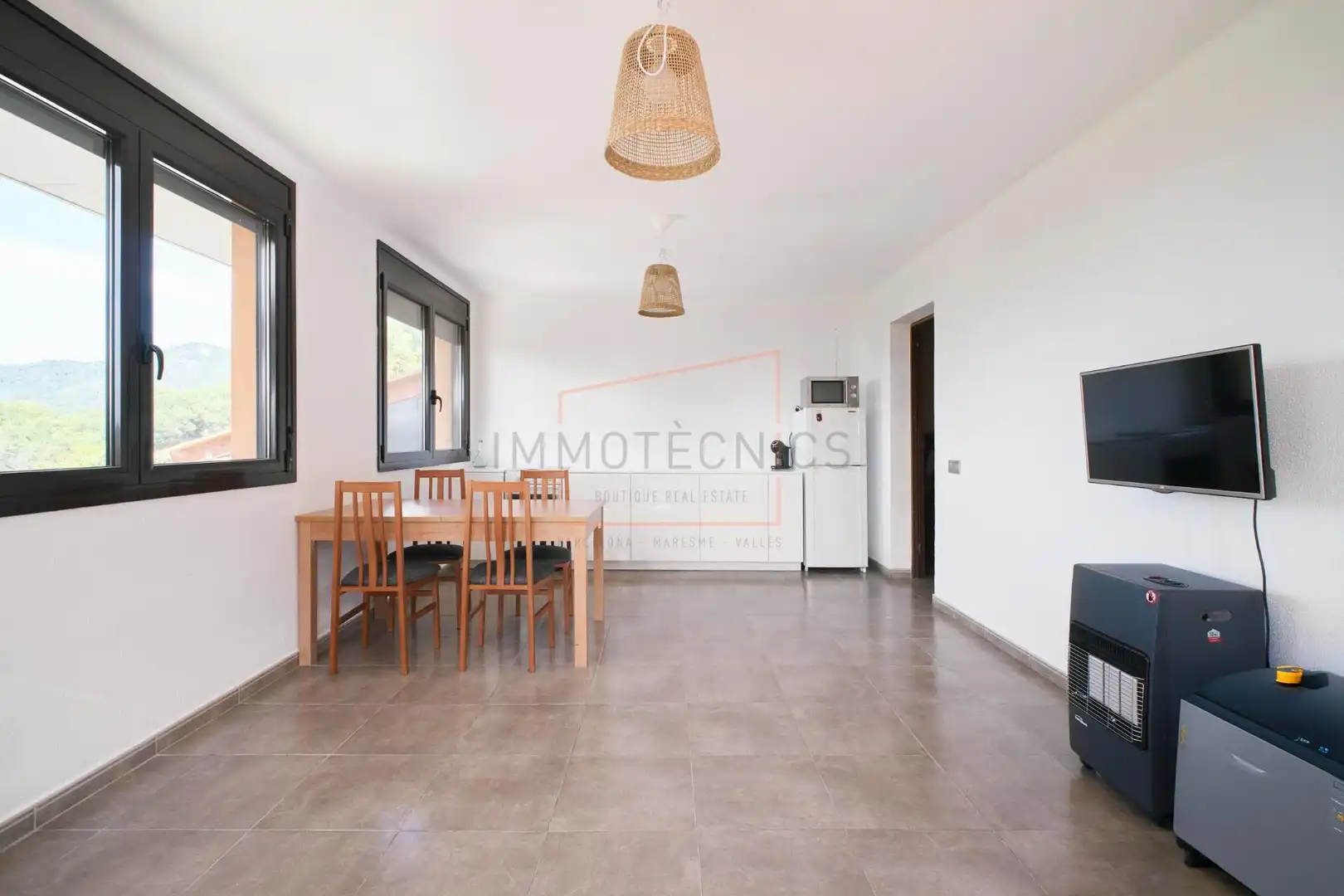 Sala d'estar de Casa o xalet en venda en Vilanova del Vallès amb Jardí privat, Terrassa i Piscina