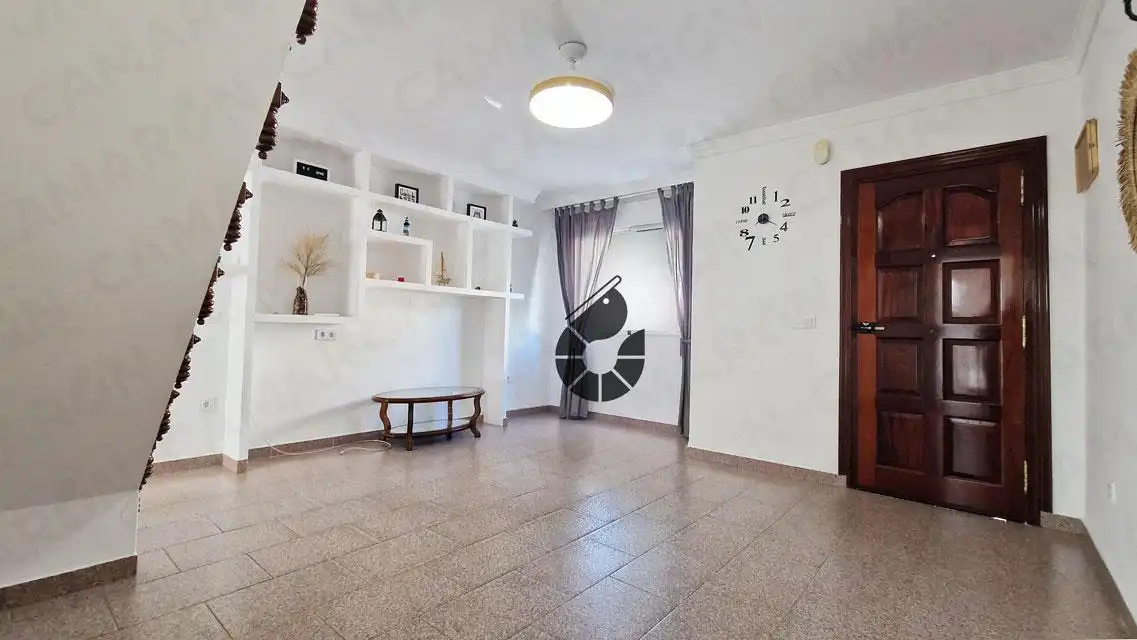 Sala de estar de Casa adosada en venta en Coria del Río con Aire acondicionado y Trastero