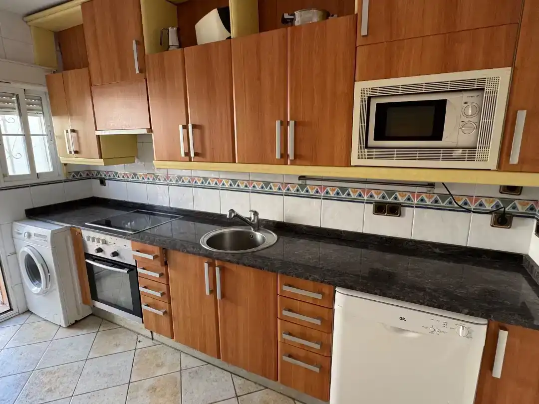 Cuina de Casa adosada de lloguer en Cunit amb Aire condicionat, Parquet i Traster