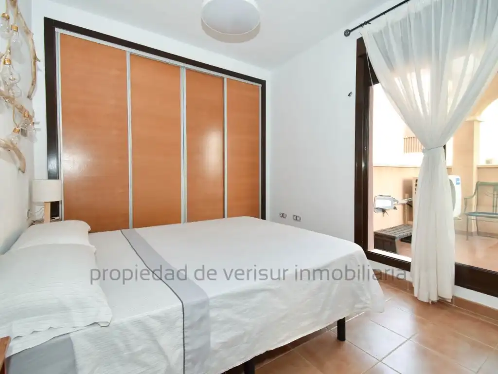 Habitación de Apartamento de alquiler en Águilas con Aire acondicionado, Jardín privado y Piscina